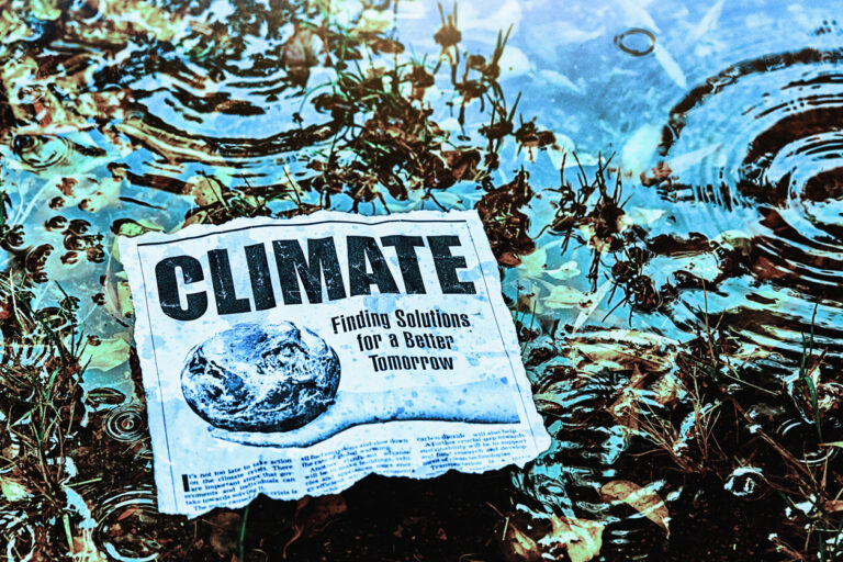 Newspaper headline and article about climate change in a swampy area about managing aging infrastructure.