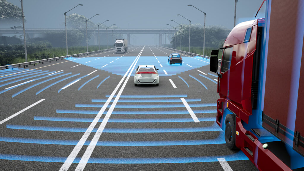 Vehicles on the road with detector icons.