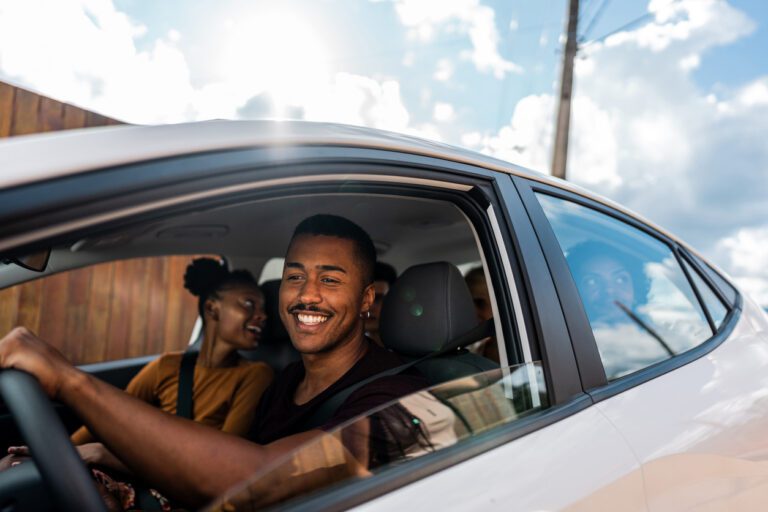 Safer roads for cyclists and motorists - a group of family happily having a road trip.